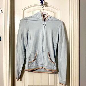 A thin worn hoodie with a bit of color